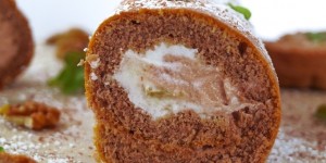 Beitragsbild des Blogbeitrags Biskuitroulade mit einer Mandarinen-Schokoladenfüllung