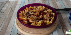 Beitragsbild des Blogbeitrags Nudelauflauf mit Prosciutto und getrockneten Tomaten