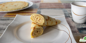 Beitragsbild des Blogbeitrags Palatschinken mit Amaretto-Mandel-Creme