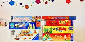 Beitragsbild des Blogbeitrags Die Top 11: Unsere liebsten Familienspiele für 5-Jährige