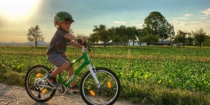 Beitragsbild des Blogbeitrags 2 Jahre mit dem woom Kinderfahrrad – ein Erfahrungsbericht 