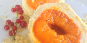 Beitragsbild des Blogbeitrags Marillenknödel in Topfenteig mit Marzipankern