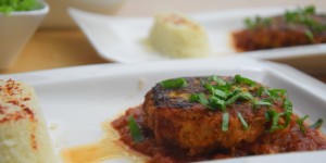 Beitragsbild des Blogbeitrags Fischfrikadellen in orientalischer Tomatensauce