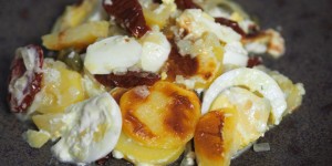 Beitragsbild des Blogbeitrags Kartoffelauflauf mit getrockneten Tomaten und Kapernbeeren 