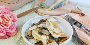 Beitragsbild des Blogbeitrags pikante Champignon Palatschinken mit Piave DOP Käse