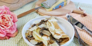 Beitragsbild des Blogbeitrags pikante Champignon Palatschinken mit Piave DOP Käse 