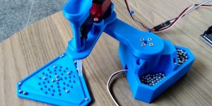 Beitragsbild des Blogbeitrags This 3D-printed SCARA robot dispenses ball bearings 