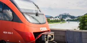 Beitragsbild des Blogbeitrags Per Zug nach Salzburg reisen