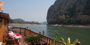 Beitragsbild des Blogbeitrags Laos entspannt: Den Mekong per Schiff entdecken – Mit Video