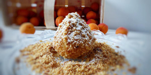 Beitragsbild des Blogbeitrags Marillenknödel mit Nougat Marzipanfülle 