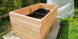 Beitragsbild des Blogbeitrags Hochbeet selber bauen aus Holz: Anleitung