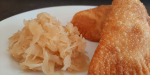 Beitragsbild des Blogbeitrags Fleischkrapfen – eine Gaumenfreude der österreichischen Küche