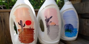 Beitragsbild des Blogbeitrags Waschmittelflaschen-Upcycling: Gießkannen