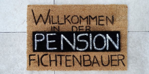 Beitragsbild des Blogbeitrags Geschenk zur Pension: die persönliche Türmatte