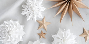 Beitragsbild des Blogbeitrags DIY-Weihnachtszauber: Mini-Sterne aus Papiertüten einfach selber machen
