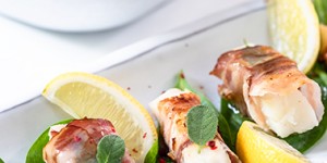 Beitragsbild des Blogbeitrags Saltimbocca vom Kabeljau mit mediterranem Ofengemüse