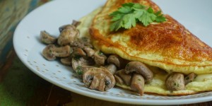 Beitragsbild des Blogbeitrags Käse – Omelett mit Champignons „trifolati“