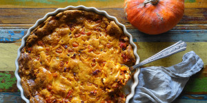 Beitragsbild des Blogbeitrags Clafoutis mit Kürbis & Speck