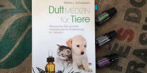 Beitragsbild des Blogbeitrags Duftmedizin für Tiere – Buchreview 