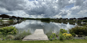Beitragsbild des Blogbeitrags Übernachten im Penati Golf Resort: Schöner Wohnen im Haus am See