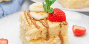 Beitragsbild des Blogbeitrags Milchreisschnitten Rezept – Leckerer Fitness Snack für Kinder und Sportler