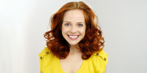 Beitragsbild des Blogbeitrags Lachen macht Happy – was steckt hinter dem freundlichen Grinsen?