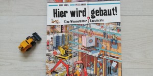 Beitragsbild des Blogbeitrags Stadtentwicklung und Baustelle: Hier wird gebaut! Eine Wimmelbilder-Geschichte 