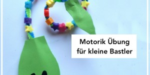 Beitragsbild des Blogbeitrags Einfache Motorik Übung für kleine Bastler | Schlange fädeln aus Pfeifenputzern 