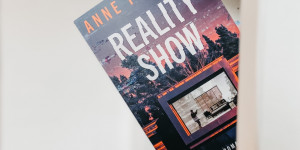 Beitragsbild des Blogbeitrags Rezension – Reality Show