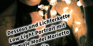 Beitragsbild des Blogbeitrags Dessous und Lichterkette Low Light Portrait mit Female Model Marietta im Fotostudio