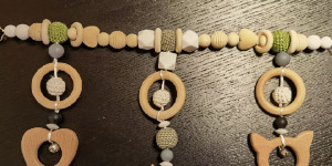 Beitragsbild des Blogbeitrags Kinderwagen Kette DIY