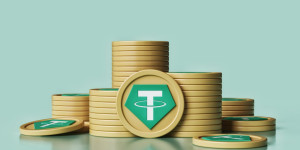 Beitragsbild des Blogbeitrags Tethers “rekordbrechender” Gewinn im vierten Quartal teilweise auf die Gold- und BTC-Preissteigerung zurückzuführen 