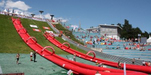 Beitragsbild des Blogbeitrags Wet & Wild Ski Jump Waterslide at Bergisel!