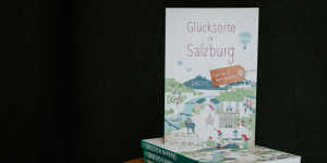 Beitragsbild des Blogbeitrags [Noch 8 Tage bis Weihnachten] Drei Ausgaben von „Glücksorte in Salzburg“ aus dem Droste Verlag 