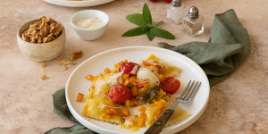 Beitragsbild des Blogbeitrags Kürbis Ravioli mit Tomaten-Walnuss-Butter