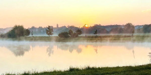 Beitragsbild des Blogbeitrags Erfahrung Sunrise Marathon: Immer wieder geht die Sonne auf!