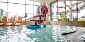 Beitragsbild des Blogbeitrags Ausflug mit Kind: Therme Laa 