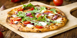 Beitragsbild des Blogbeitrags Die perfekte Pizza vom Grill – Ratgeber, Tipps & wertvolle Ideen 